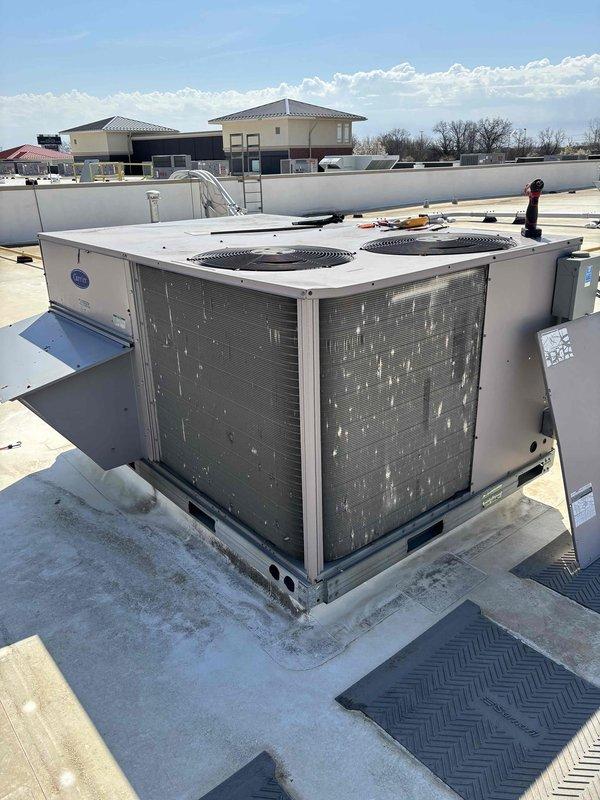 Completed quarterly BFMA preventive maintenance on commercial rooftop unit, including comprehensive tune-up procedures, filter replacement, and system inspection. Identified and replaced failed dual-run capacitor showing visible corrosion and oxidation at terminals, which was affecting compressor and condenser fan operation. Verified all electrical components with multimeter readings, confirmed proper system operation, and documented equipment condition with photographic records per maintenance agreement requirements.