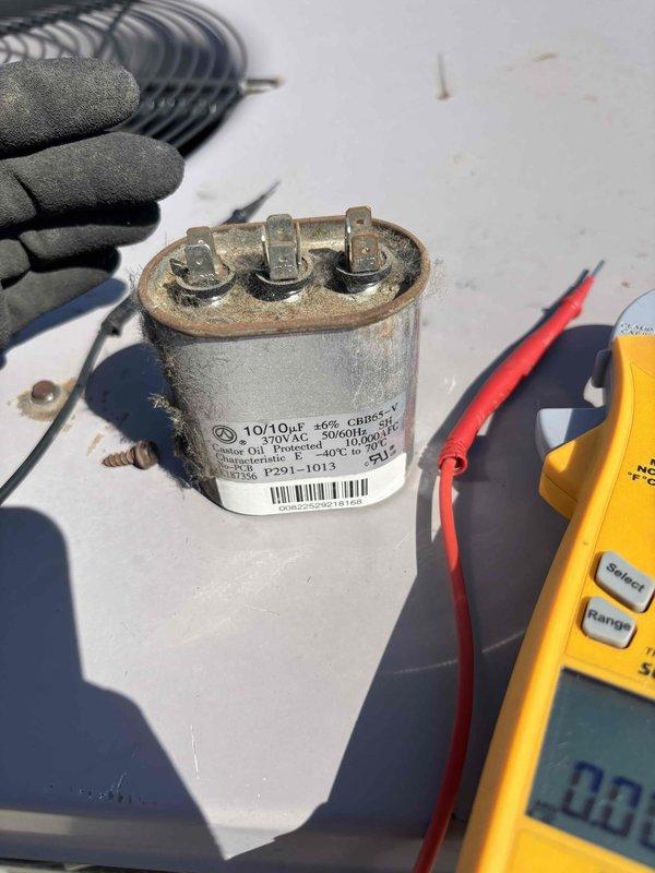 Completed quarterly BFMA preventive maintenance on commercial rooftop unit, including comprehensive tune-up procedures, filter replacement, and system inspection. Identified and replaced failed dual-run capacitor showing visible corrosion and oxidation at terminals, which was affecting compressor and condenser fan operation. Verified all electrical components with multimeter readings, confirmed proper system operation, and documented equipment condition with photographic records per maintenance agreement requirements.