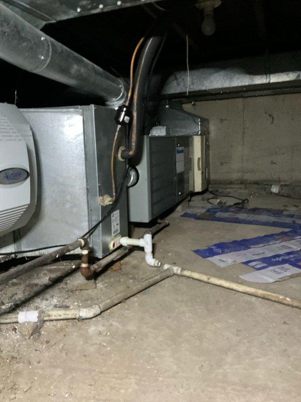 Responded to service call regarding burning rubber smell from furnace as reported by homeowner and fire department. Upon arrival, performed comprehensive inspection of furnace and blower motor assembly. Conducted visual examination of all mechanical components, electrical connections, and blower motor operation. Documented equipment condition through photographic evidence of HVAC system installation, including furnace unit, air handler, refrigerant lines, and associated mechanical room infrastructure. Verified proper operation of all safety controls and monitored system for abnormal odors during runtime. Blower motor and belt assembly inspected for signs of overheating, friction wear, or component failure. All findings documented and communicated to authorized contact per customer request.