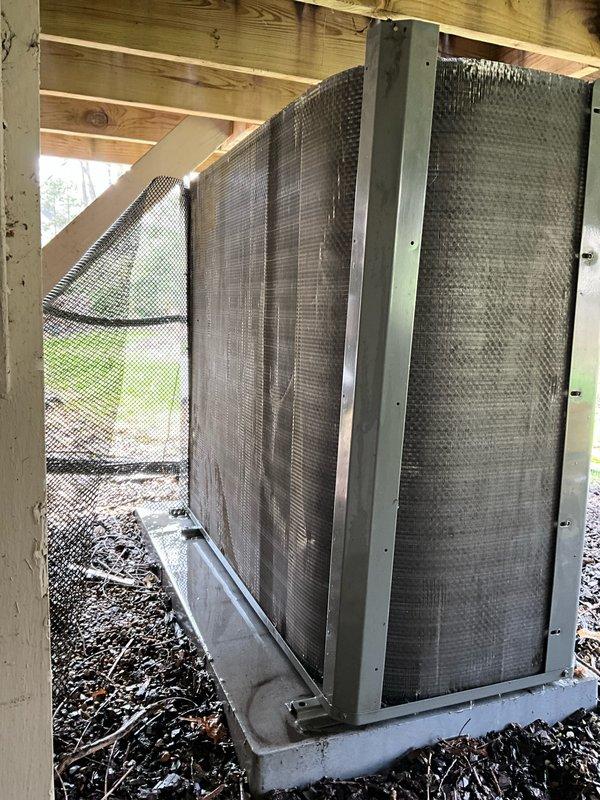 Performed comprehensive air conditioning tune-up on 4-year-old residential outdoor condensing unit. Conducted electrical diagnostics using clamp meter, measuring amperage draw at 6.1 amps and verifying proper voltage to compressor and capacitor. Inspected condenser coils, which showed normal wear and minor debris accumulation from outdoor exposure beneath deck structure. Verified all electrical connections, tested capacitor performance, and confirmed unit operational parameters within manufacturer specifications.