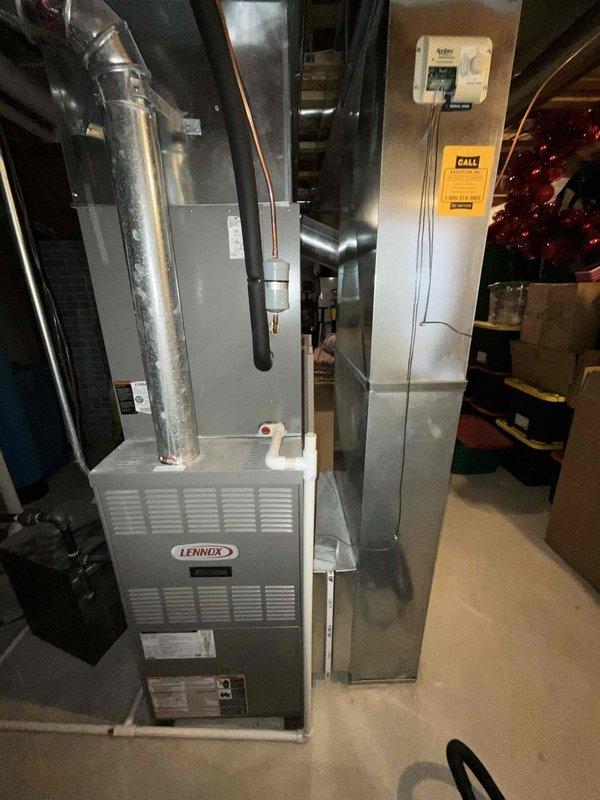 Completed comprehensive furnace tune-up on Lennox unit located in basement mechanical room. Performed full system inspection including burner assembly cleaning, flame sensor maintenance, blower motor lubrication, and air filter evaluation. Verified proper operation of all safety controls, tested ignition sequence, and confirmed adequate airflow through ductwork. All components found operating within manufacturer specifications with no immediate repairs required.