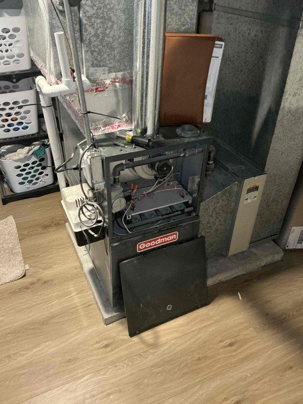 Completed HVAC estimate for replacement of 26-year-old air conditioning system utilizing R-410A refrigerant. Unit was found to be low on refrigerant charge, indicating potential leak or system degradation due to age. Assessed existing Goodman furnace installation and ductwork configuration in basement mechanical space to determine appropriate equipment sizing and compatibility for new A/C and evaporator coil replacement.