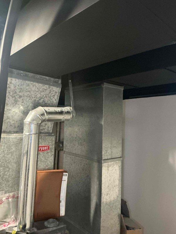 Completed HVAC estimate for replacement of 26-year-old air conditioning system utilizing R-410A refrigerant. Unit was found to be low on refrigerant charge, indicating potential leak or system degradation due to age. Assessed existing Goodman furnace installation and ductwork configuration in basement mechanical space to determine appropriate equipment sizing and compatibility for new A/C and evaporator coil replacement.