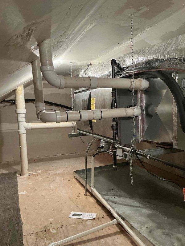 Conducted estimate for 19-year-old attic-mounted furnace system for recurring client. Inspected air handler unit, ductwork configuration, condensate drainage system, and electrical components; documented current equipment condition and discussed available replacement options and current promotional offerings with homeowner.