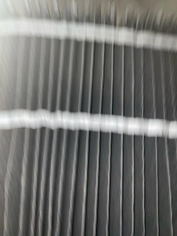 Completed comprehensive BFMA tune-up on residential HVAC system including air conditioning performance evaluation and filter replacement. Inspected heat exchanger fins, verified refrigerant lines, condensate pump operation, and all system connections including PVC drainage and ductwork. Addressed thermostat alert notifications, confirmed all equipment operating within normal parameters, and cleared non-critical system alerts after verifying proper function of 4+ year old dual-unit installation with humidifier integration.