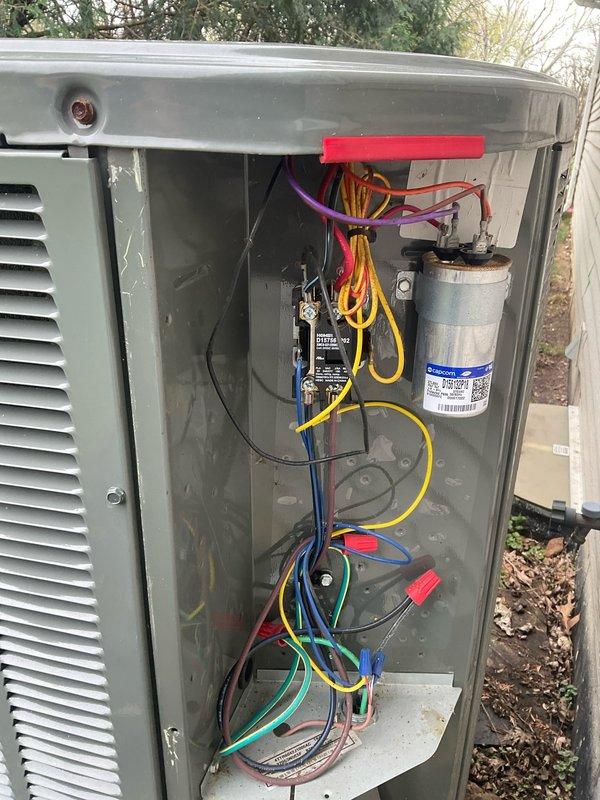 Completed non-member air conditioning tune-up on a 3-year-old Trane outdoor condensing unit. Performed comprehensive system inspection including visual examination of exterior cabinet condition, electrical disconnect, refrigerant lines, and concrete pad placement. Accessed electrical compartment to inspect dual-run capacitor, contactor, wiring connections, and wire terminals for proper operation and secure connections. All components found in good working condition with no immediate repairs needed. System operating within normal parameters.