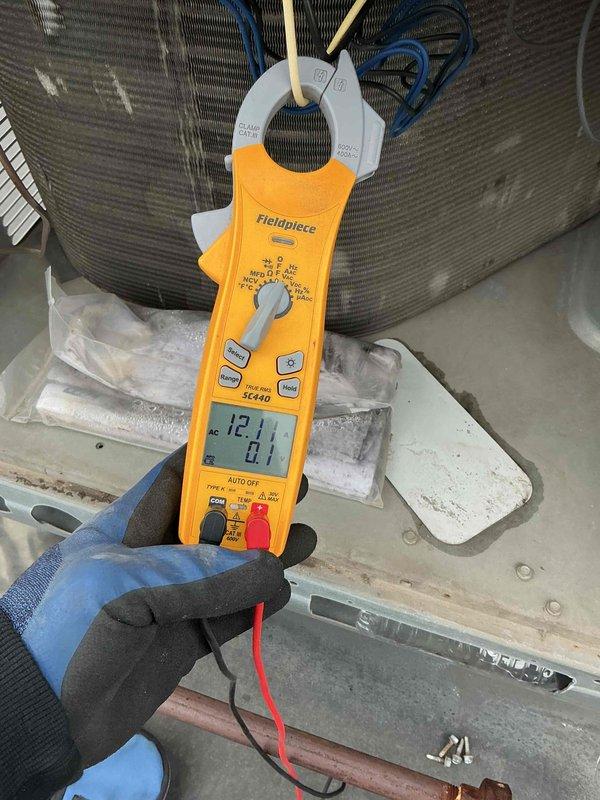 Completed comprehensive BFMA tune-up service on 15-year-old rooftop unit including full AC system inspection and filter replacement. Performed electrical diagnostics using clamp meter, recording amperage readings to verify proper compressor operation and system performance. Replaced multiple air filters of various sizes throughout the system, removing accumulated dust and debris to restore proper airflow and system efficiency.