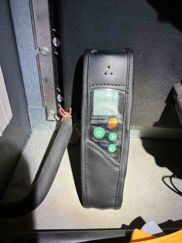 Responded to afternoon service call for UV light replacement on HVAC system. Successfully removed existing UV bulb assembly and installed new ultraviolet sterilization unit with blue electrical connection and protective housing. Performed system testing using Testo 317-3 diagnostic equipment to verify proper operation and confirm air quality parameters were within normal range following installation.