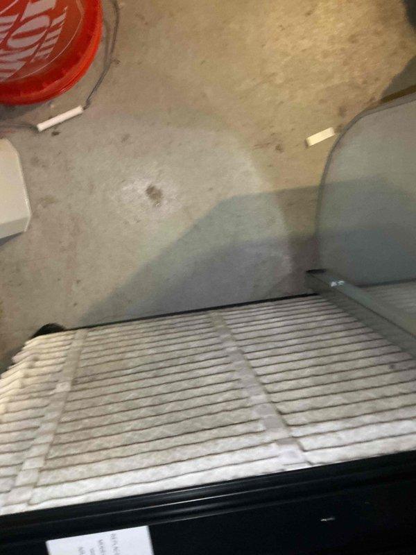 Completed comprehensive BFMA air conditioning tune-up on residential split system. Performed standard preventive maintenance protocol including inspection of indoor air handler and outdoor condensing unit. Replaced dirty pleated air filter at indoor unit to restore proper airflow and system efficiency. Accessed outdoor unit by removing side panel to inspect condenser coil, which showed moderate accumulation of dirt and debris on aluminum fins. Cleaned condenser coil to improve heat transfer efficiency and system performance. Verified fan operation and inspected all accessible components for wear or damage. System operational and ready for cooling season.