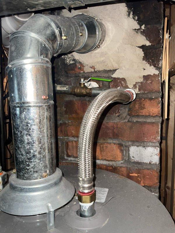 Completed comprehensive BFPMA tune-up service with complimentary plumbing inspection at residential property. Performed thorough evaluation of 9-year-old water heater system, including inspection of gas connections, flexible supply lines, shut-off valves, and venting components in basement utility area. Documented existing plumbing infrastructure conditions and verified proper operation of all accessible plumbing fixtures and connections throughout the premises.