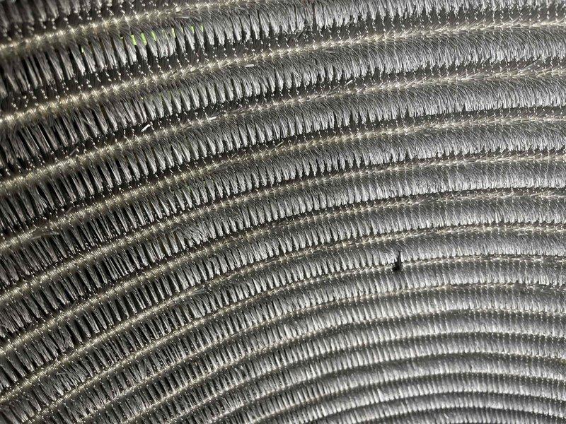Completed comprehensive air conditioning tune-up on residential unit aged 9+ months. Performed thorough inspection of condenser coil fins, which were found to be in clean condition with proper spacing and no significant debris accumulation. Verified all system components for proper operation and documented equipment condition through photographic records of condenser unit and basement mechanical area including sump pump system.