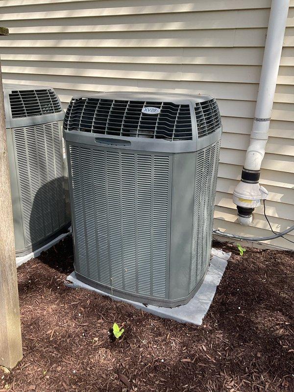 Completed comprehensive BFMA tune-up service on two outdoor AC condenser units, both over 9 years old. Performed thorough cleaning of heavily soiled condenser coils which exhibited significant dirt, dust, and debris accumulation in the metal fins. Inspected both units for proper operation, checked refrigerant levels, tested electrical connections, and replaced air filters. Both systems operating within normal parameters upon completion of preventive maintenance service.