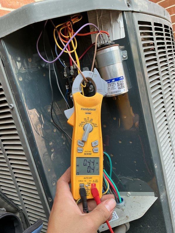 Completed comprehensive BFMA tune-up on 7-year-old Trane XR commercial air conditioning system. Performed full system diagnostics including electrical measurements with digital multimeter, inspected dual-run capacitor and associated wiring connections, verified proper component operation, and documented equipment condition with photographic records. All components found operating within manufacturer specifications with no immediate service needs identified.