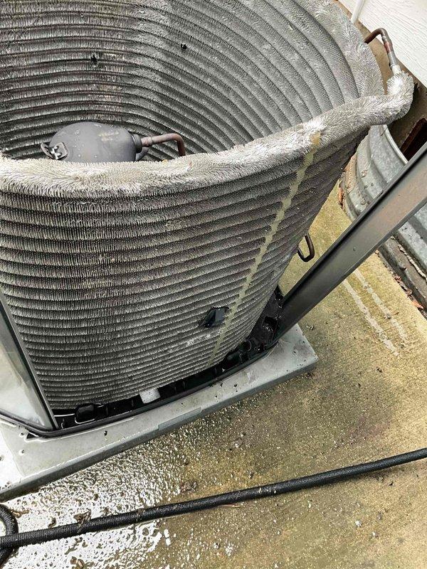 Completed comprehensive BFMA tune-up on 9+ year old air conditioning system. Performed standard maintenance protocol including inspection of condenser coil assembly, which showed significant accumulation of dust, dirt, and debris between fins and on outer surfaces. Evaluated electrical connections, capacitor, and overall unit operation to ensure proper system performance for the cooling season.