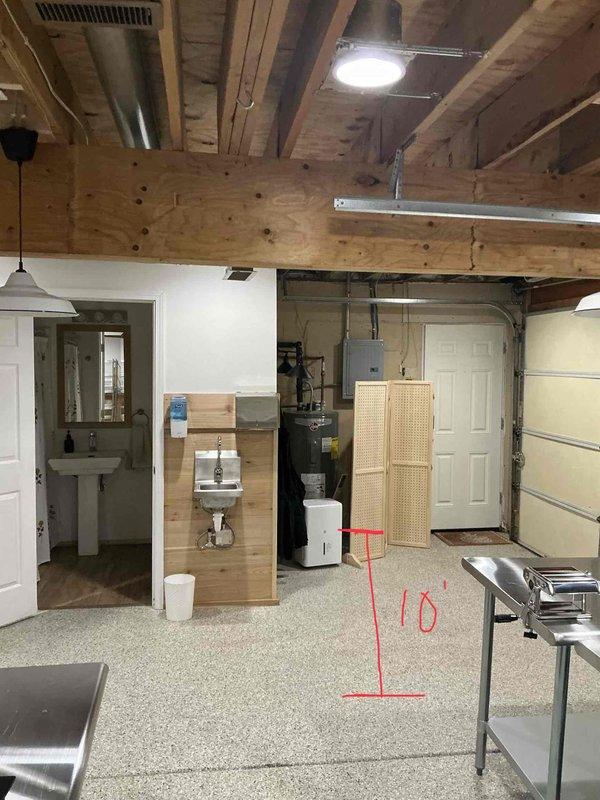 Completed sales estimate for air conditioning system replacement at residential property. Evaluated existing HVAC system located in garage area, including current furnace unit and ductwork configuration. Assessed installation requirements for new AC unit and evaporator coil replacement, examining existing ductwork runs, electrical service accessibility, and optimal equipment placement. Documented current system setup with photos showing furnace cabinet, supply and return duct routing along ceiling joists, and available workspace for new equipment installation. Provided comprehensive estimate for complete AC and coil replacement to address client's cooling system needs.