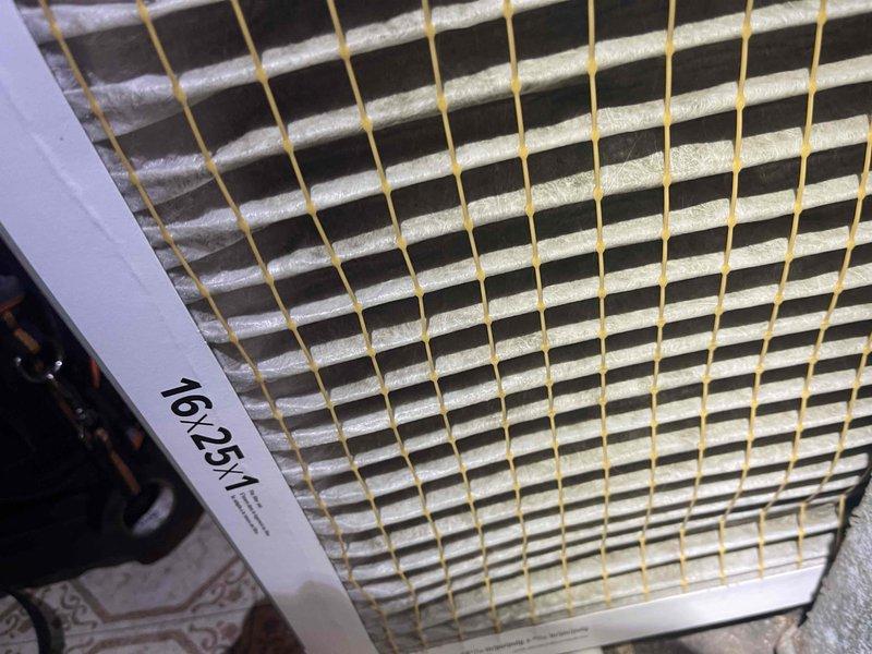 Completed comprehensive spring air conditioning tune-up and system inspection at residential property. Performed full preventative maintenance including inspection of all major components, verified proper system operation, and documented equipment condition with photographic records. Inspected and confirmed 16x25x1 air filter in satisfactory condition with clean metallic pleated media showing proper airflow capacity.