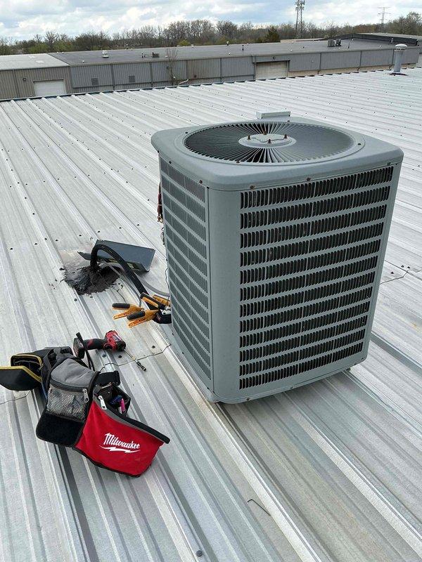 Completed commercial BFMA tune-up service on rooftop AC unit 5, a 10-year-old system. Performed comprehensive preventive maintenance including electrical diagnostics using clamp meter, recording amp draw and voltage readings to verify proper compressor operation. Inspected condenser coil fins, refrigerant line connections, and overall unit condition, confirming equipment is operating within normal parameters for continued reliable service.