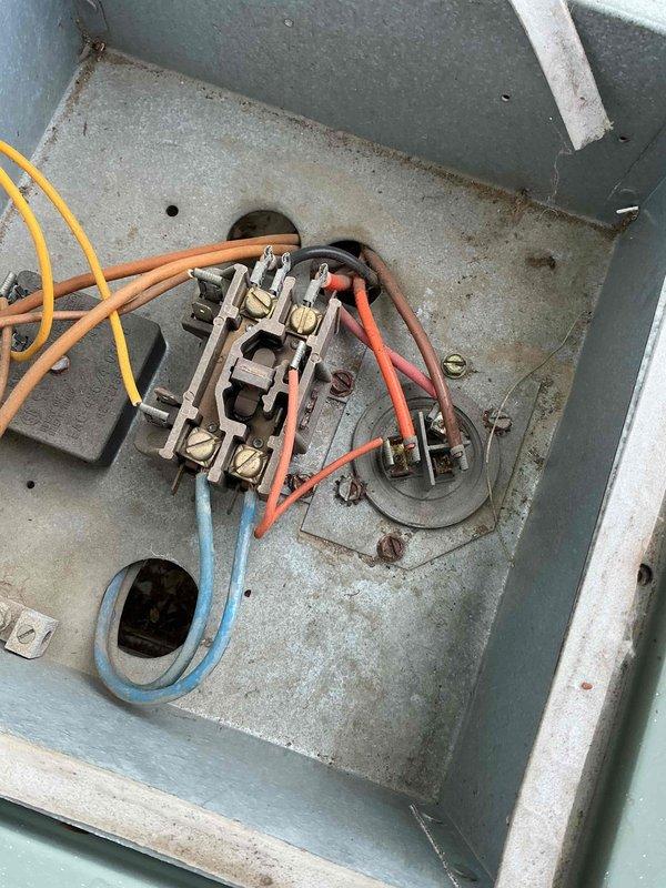 Responded to no cooling complaint for second floor unit. Upon arrival, performed diagnostic inspection of both outdoor condensing units and associated electrical components. Tested system operation and found unit functioning normally with no fault detected at time of service call. Inspected contactor and electrical connections, noting age-related wear and corrosion on components. System operating within normal parameters during technician observation.