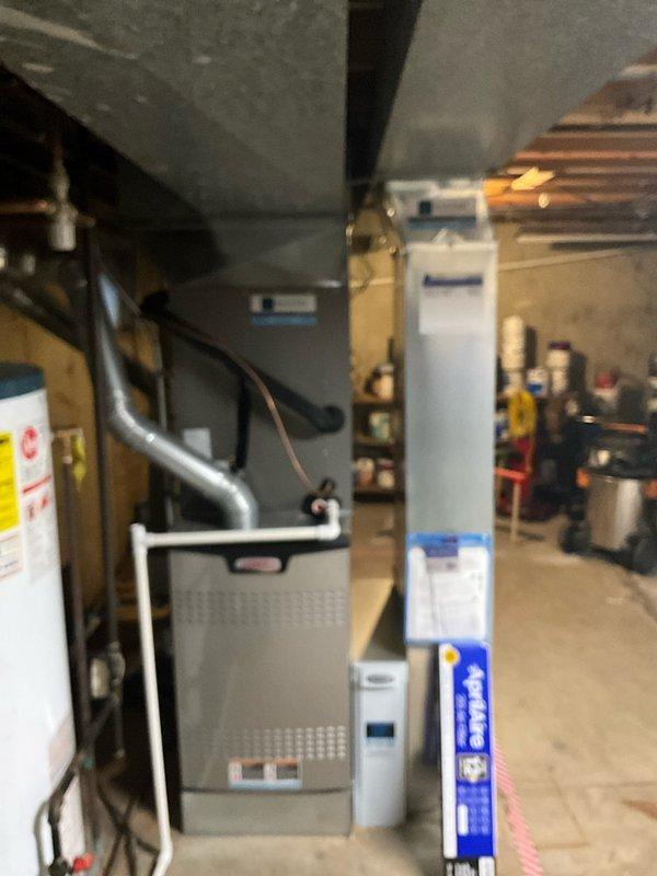 Completed comprehensive air conditioning tune-up on two AC units located in basement utility area. Performed standard maintenance protocol including inspection of blower wheel assembly, verified proper blade alignment and cleanliness, checked motor shaft connections, and examined overall system components. Confirmed equipment operational status with no immediate concerns identified during inspection of ductwork, condensate lines, and surrounding HVAC infrastructure.
