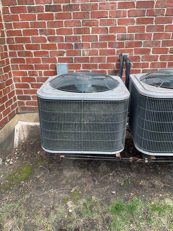 Completed partial BFMA tune-up service on residential HVAC system with dual outdoor AC condenser units. Replaced furnace filter in basement unit and performed inspection of blower motor and electrical components, confirming operational status. Full system tune-up including outdoor condenser maintenance requires rescheduling to complete remaining service protocol.