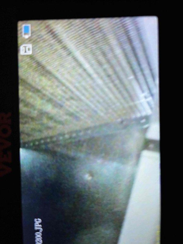 Responded to service call for outdoor condensing unit displaying error codes and failure to cool. Performed comprehensive BFMA tune-up on 8+ year old system, including inspection of refrigerant lines showing oxidation, examination of coil assembly and mesh housing, verification of electrical connections and fasteners, and diagnostic assessment of ductwork components. System evaluated for proper operation, all components cleaned and adjusted per manufacturer specifications, with photographic documentation captured for service records.