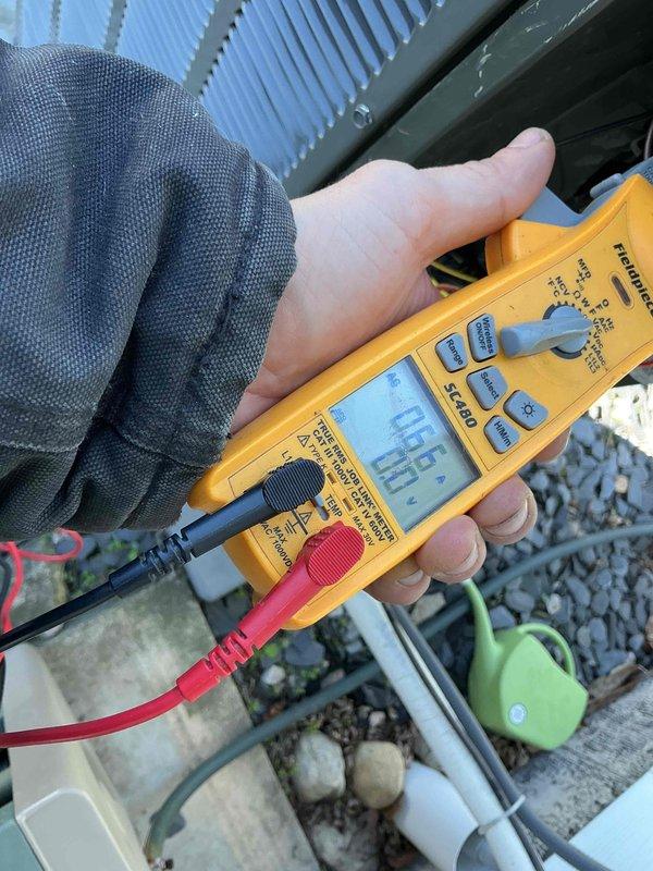 Completed comprehensive air conditioning tune-up on a 3-year-old system. Performed standard maintenance protocol including inspection of blower wheel assembly, which showed normal dust accumulation for equipment age. Verified system voltage at 24.5V at outdoor condenser unit, confirming proper low-voltage control circuit operation. All components operating within manufacturer specifications.