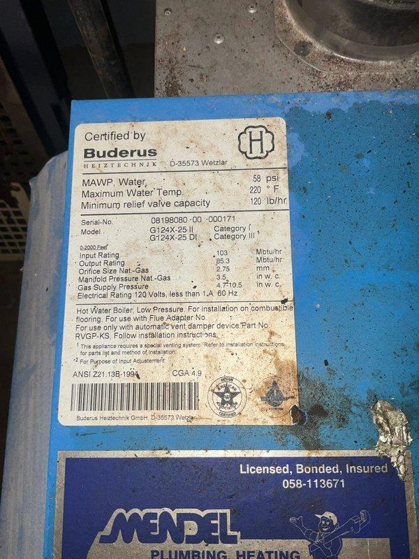 Responded to service call for Buderus G124X-25 II boiler with electronic malfunction caused by water intrusion from leaking overhead copper piping. Diagnosed severely corroded copper supply line above boiler that had been actively leaking onto unit's control board and electrical components. Repaired deteriorated piping section and replaced corroded fittings to eliminate leak source. Dried and inspected boiler electronics, tested all safety controls, and verified proper system operation before restoring unit to service.
