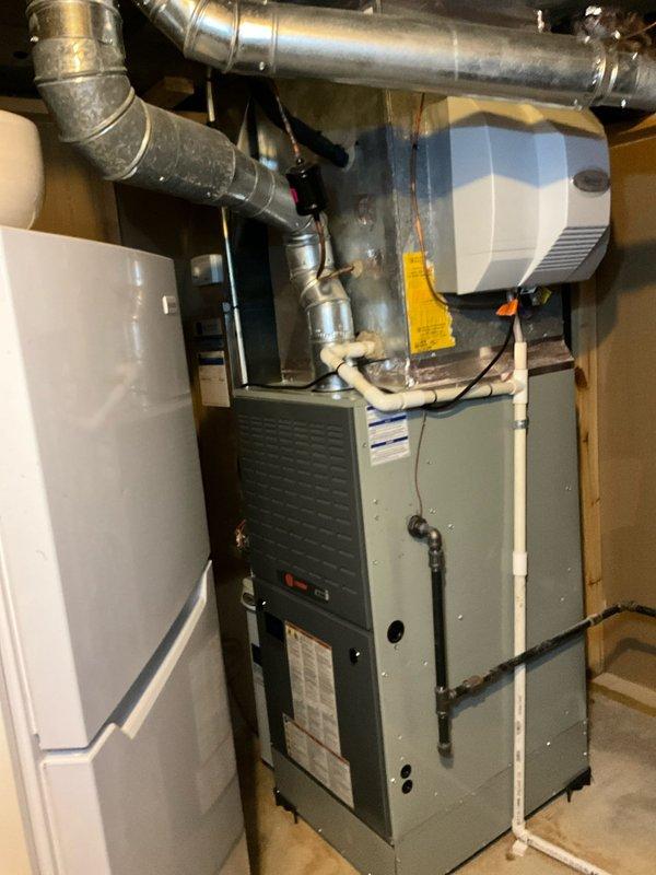 Completed comprehensive BFMA tune-up service on 13-year-old residential HVAC system, including full AC maintenance and semi-annual filter change. Inspected and serviced basement furnace unit, associated ductwork, and outdoor condenser unit; verified proper operation of all components including humidifier accessory. System tested and confirmed operational with all equipment functioning within normal parameters.