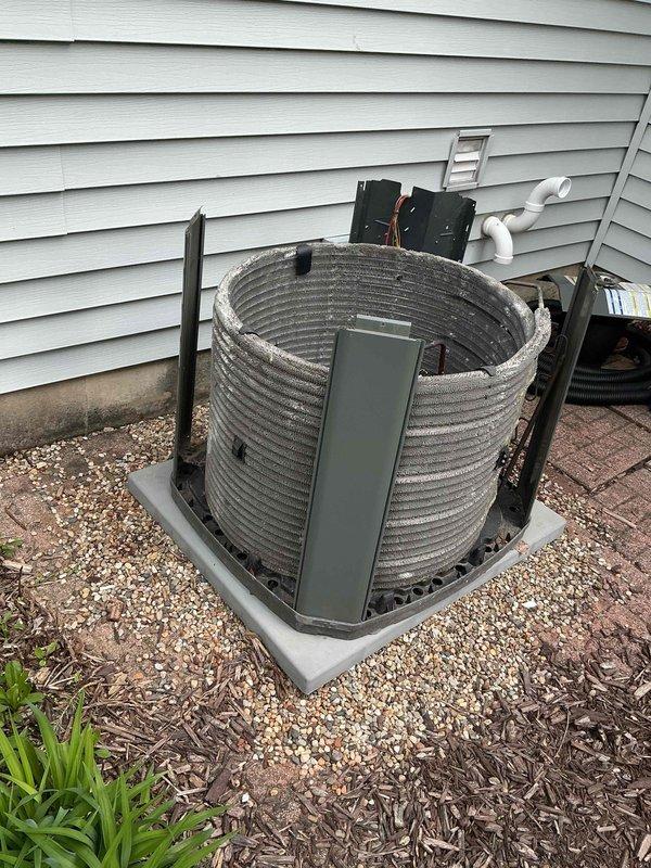 Completed comprehensive AC tune-up on residential condenser unit. Performed system inspection, added UV fluorescent dye to refrigerant circuit for leak detection monitoring, and assessed coil condition which showed heavy accumulation of dirt and debris on exterior surfaces. Unit operational at time of service completion with all safety checks performed according to maintenance protocol.