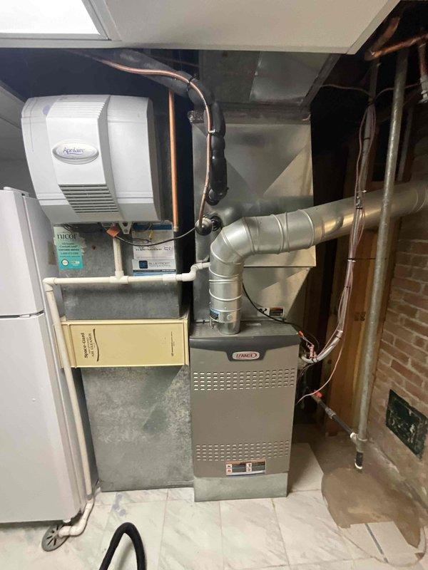Completed comprehensive BFMA tune-up maintenance on three-unit HVAC system including 12-year-old furnace with Aprilaire humidifier, 4-year-old outdoor AC condenser unit, and 3-year-old mini-split system. Performed full system inspections, cleaned all components, verified refrigerant levels, tested electrical connections, checked airflow and ductwork integrity, inspected heat exchanger, replaced filters, and confirmed all equipment operating within manufacturer specifications. All systems tested and left in proper working condition with no deficiencies noted.