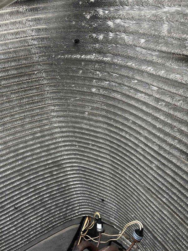 Completed comprehensive BFMA tune-up service on a 6-year-old air conditioning system during morning appointment window. Performed full system inspection including evaporator coil assessment, which showed moderate dust and debris accumulation between aluminum fins with some discoloration in upper sections. Inspected temperature sensor probe placement and verified proper positioning within coil assembly. Examined blower assembly and associated wiring connections, confirming all electrical components and color-coded wiring were secure and functioning properly. System operational and ready for cooling season.