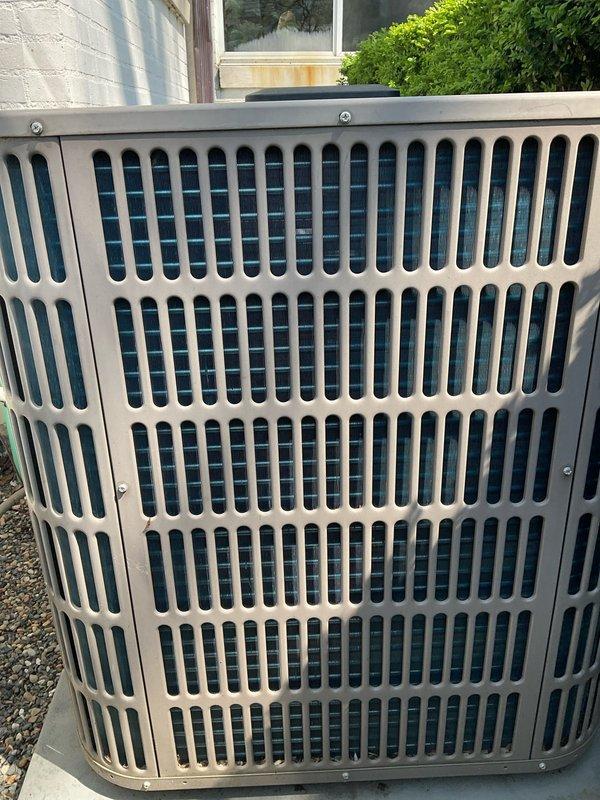 Completed comprehensive BFMA tune-up service on residential HVAC system including outdoor condensing unit and indoor air handler. Performed standard maintenance procedures on AC system, inspected refrigerant lines, condenser coils, and electrical connections on outdoor unit positioned on concrete pad. Conducted semi-annual air cleaner filter change service and verified proper airflow through ductwork system in attic space. All equipment operating within normal parameters upon completion of preventive maintenance service.
