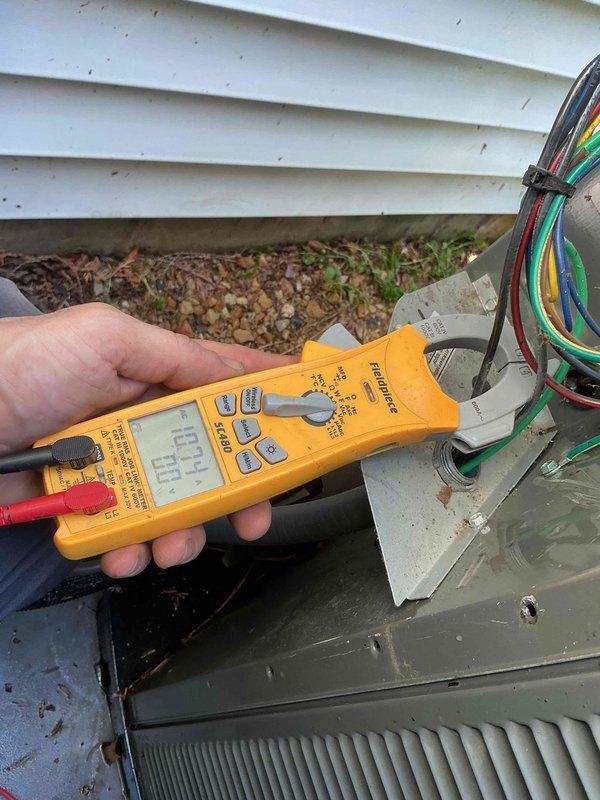 Completed comprehensive BFMA tune-up on outdoor air conditioning unit over 3 years old, including electrical testing with digital multimeter to verify proper voltage and amperage readings at the condenser unit. Performed thorough inspection of evaporator and condenser coils, refrigerant lines, and all electrical connections, replaced #213 air filter, and confirmed system is operating within manufacturer specifications with all components functioning properly.