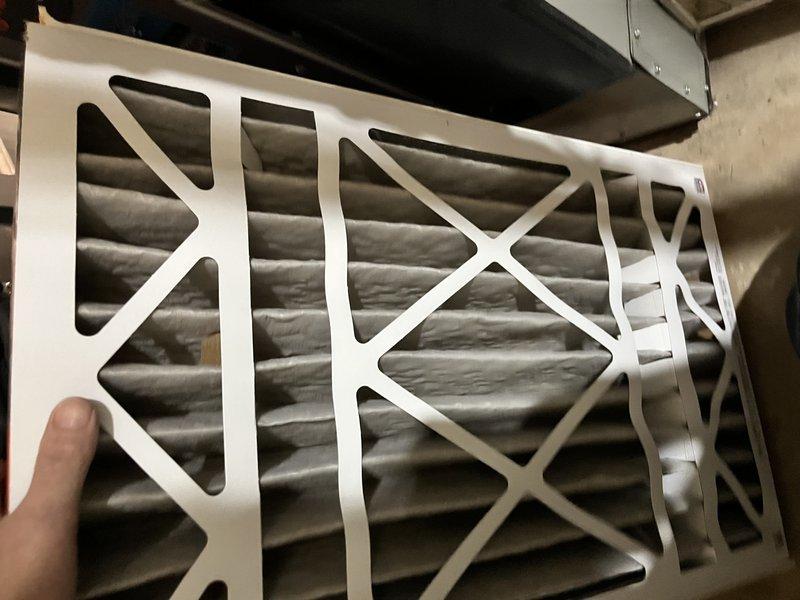 Completed comprehensive duct cleaning service for single-system commercial HVAC installation. Removed substantial dust and debris accumulation from interior ductwork, including heavy buildup on duct walls and support structures. Inspected and replaced dirty pleated air filter showing significant particulate capture and discoloration, restoring proper airflow and system efficiency.