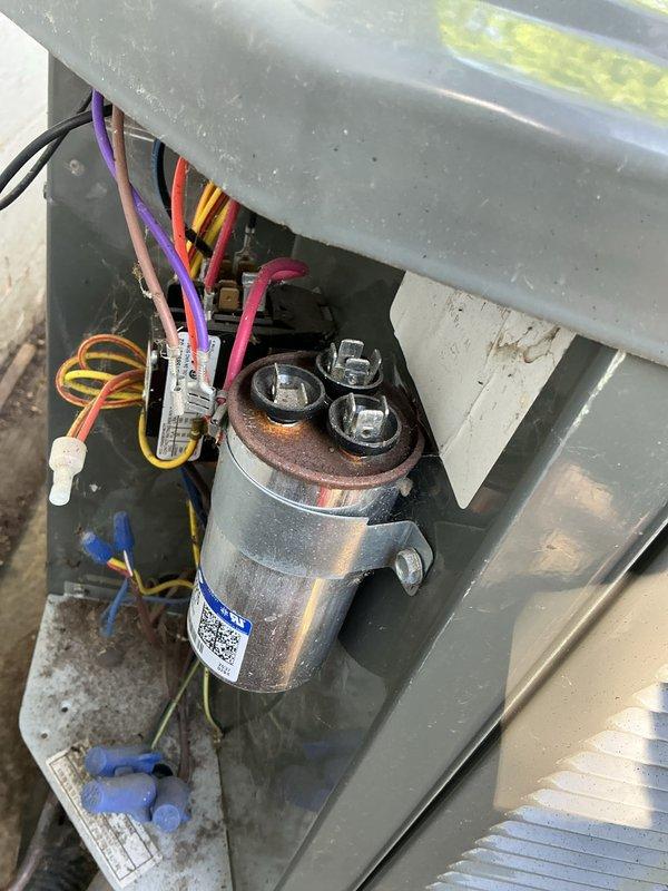 Completed comprehensive BFMA tune-up on 5+ year old air conditioning system in tight access area. Performed electrical diagnostics using digital multimeter, verified capacitor operation and electrical connections, inspected condenser unit components including fan assembly and control panel wiring. All systems tested and operating within normal parameters upon completion.