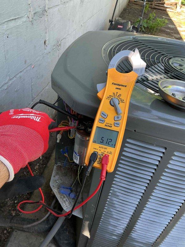 Completed comprehensive BFMA tune-up on 5+ year old air conditioning system in tight access area. Performed electrical diagnostics using digital multimeter, verified capacitor operation and electrical connections, inspected condenser unit components including fan assembly and control panel wiring. All systems tested and operating within normal parameters upon completion.