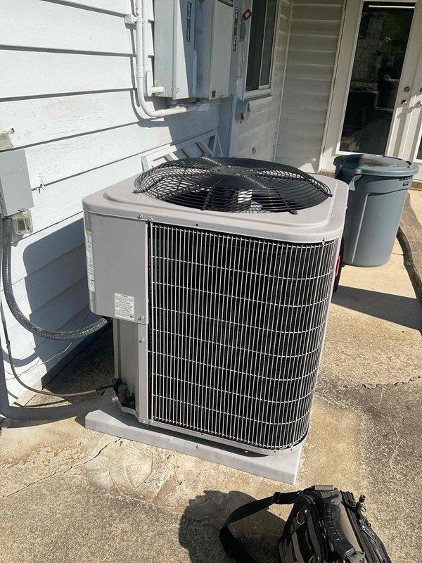 Completed follow-up service call to residential air conditioning system. Added ultraviolet dye tracer to refrigerant circuit and charged system with approximately one pound of R-410A refrigerant as previously discussed and authorized. Unit operating properly upon departure.