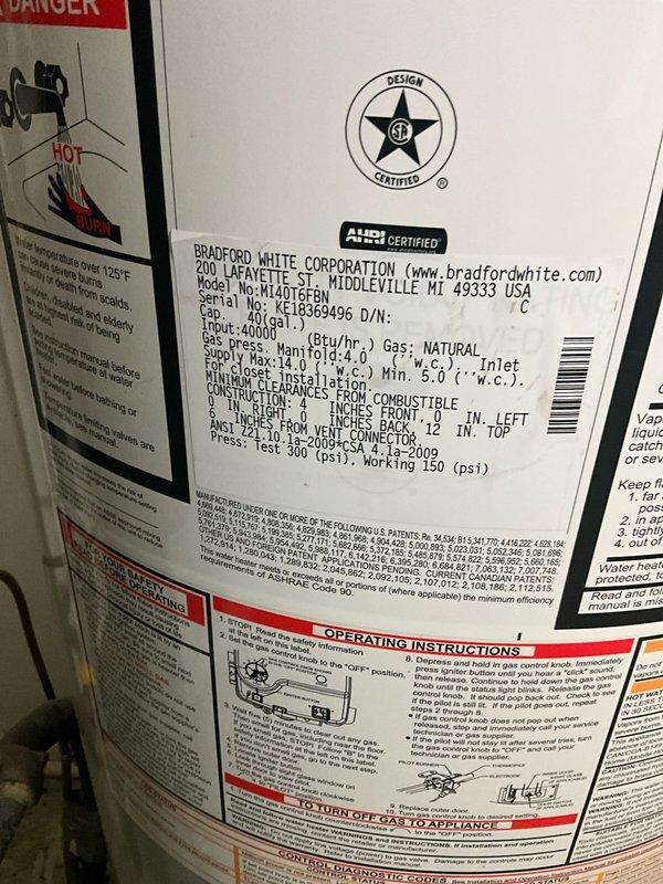 Conducted comprehensive water heater evaluation on an 8-year-old Bradford White 40-gallon natural gas unit (Model M140T6FBN) that had been recently flushed by the homeowner. Performed visual inspection of the tank exterior, verified all manufacturer labels and safety warnings were intact, assessed copper supply line connections at the top of the unit, and documented current condition with photographs for estimate purposes.
