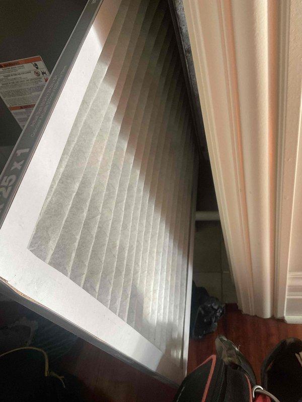 Completed comprehensive AC tune-up on two 7-year-old air conditioning units. Performed standard maintenance protocol including system inspection, refrigerant level check, electrical component testing, and condenser coil cleaning. Replaced heavily soiled air filters on both units, which showed significant dirt accumulation with visible airflow restriction patterns; installed new pleated filters to restore proper airflow and system efficiency.