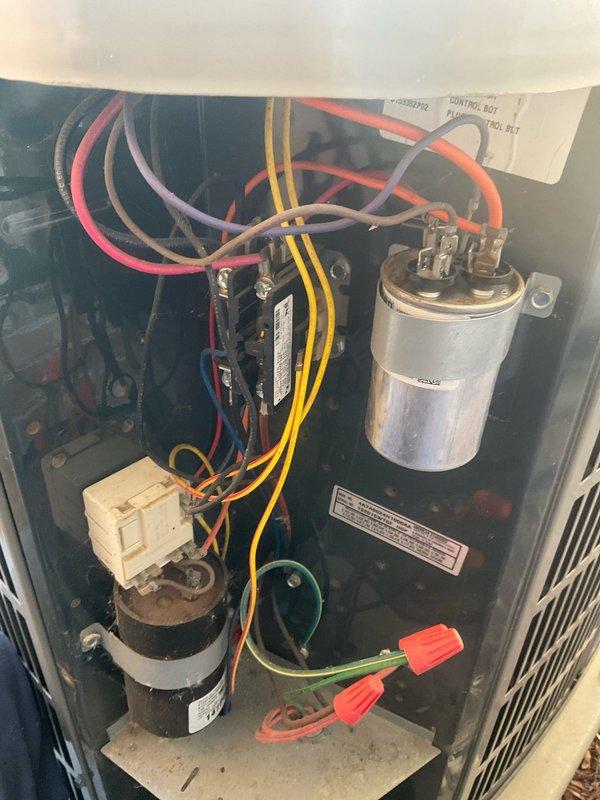 Completed comprehensive BFMA tune-up on residential air conditioning system over 5 years old during morning service window. Performed thorough inspection of evaporator coil assembly, noting moderate accumulation of dust and dirt on aluminum fins throughout multiple serpentine rows. Inspected all refrigerant lines for signs of leaks or deterioration, observing normal age-related discoloration on copper tubing. Verified filter drier condition and all refrigerant line connections at coil assembly. Examined electrical components including capacitor, motor relay, and all wire connections, confirming proper terminations and secure wire nuts. Documented equipment condition with photos showing evaporator coil configuration and electrical compartment layout. All components operating within normal parameters upon completion of tune-up procedures.
