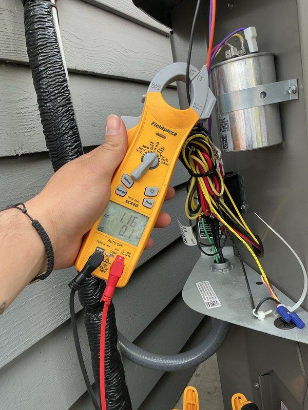 Completed comprehensive BFMA tune-up on 8-month-old air conditioning system. Performed electrical diagnostics using clamp meter, measuring amperage and voltage at outdoor unit's electrical panel, verified capacitor operation and all wire connections, and conducted full system performance evaluation. All components found operating within manufacturer specifications with no deficiencies noted.