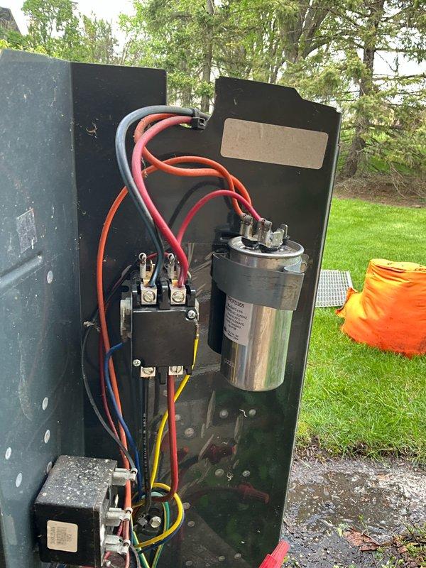 Completed comprehensive BFMA tune-up on 18-year-old air conditioning system. Performed full system inspection including electrical panel components, contactor, and capacitor verification. Inspected blower wheel assembly and housing, noting normal operational dust accumulation on blades consistent with equipment age. All electrical connections secured, components tested for proper operation, and system returned to service in functional condition.