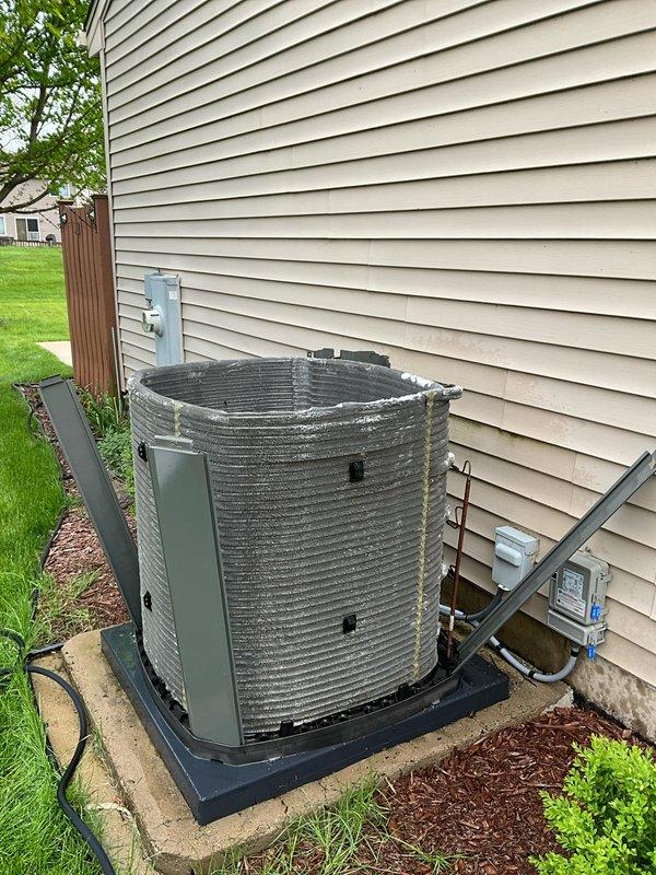 Completed comprehensive BFMA preventive maintenance tune-up on residential air conditioning system. Performed full system inspection of outdoor condenser unit, verified proper operation of compressor and condenser fan motor, checked refrigerant levels and electrical connections, cleaned condenser coils, and confirmed unit is operating within manufacturer specifications. System tested and running efficiently with adequate airflow and proper clearances maintained around equipment.