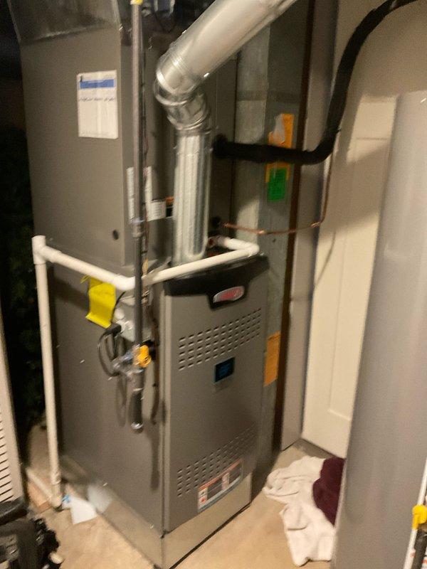 Completed comprehensive air conditioning tune-up on residential HVAC system aged one year or older. Performed standard maintenance procedures including system inspection, filter evaluation, and equipment assessment. Verified proper operation of furnace and air handler unit, inspected ductwork connections, and examined refrigerant lines for proper insulation and routing.