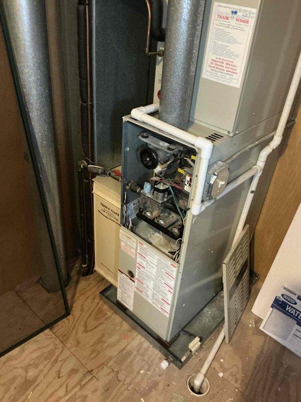 Completed comprehensive assessment of residential dual-zone HVAC system for full equipment replacement estimate. Inspected two furnace units and two air conditioning systems, with primary focus on failed second-floor A-coil evaporator. Documented existing equipment specifications, ductwork configuration, and mechanical room access conditions. Photographed internal components including blower assemblies, gas valves, refrigerant lines, electrical connections, and condensate drain systems to provide accurate replacement specifications for expedited proposal preparation.