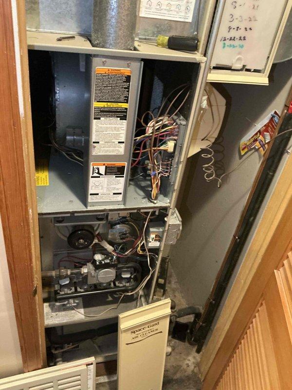 Completed comprehensive assessment of residential dual-zone HVAC system for full equipment replacement estimate. Inspected two furnace units and two air conditioning systems, with primary focus on failed second-floor A-coil evaporator. Documented existing equipment specifications, ductwork configuration, and mechanical room access conditions. Photographed internal components including blower assemblies, gas valves, refrigerant lines, electrical connections, and condensate drain systems to provide accurate replacement specifications for expedited proposal preparation.