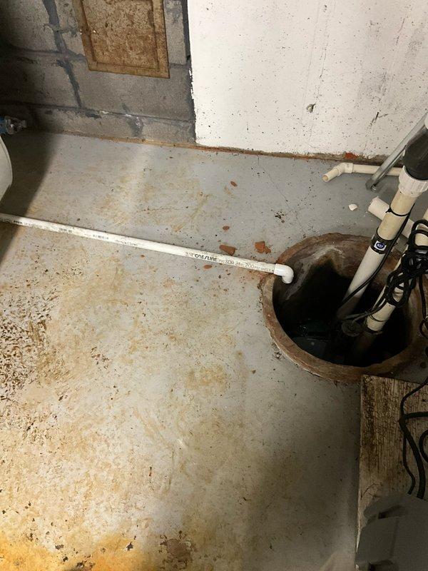 Installed a new 40-gallon Bradford White tanked water heater with expansion tank and drain pan in basement utility area. Replaced existing unit, ensuring proper code-compliant installation with all necessary safety components including thermal expansion tank to protect plumbing system from pressure buildup and drain pan for leak protection.