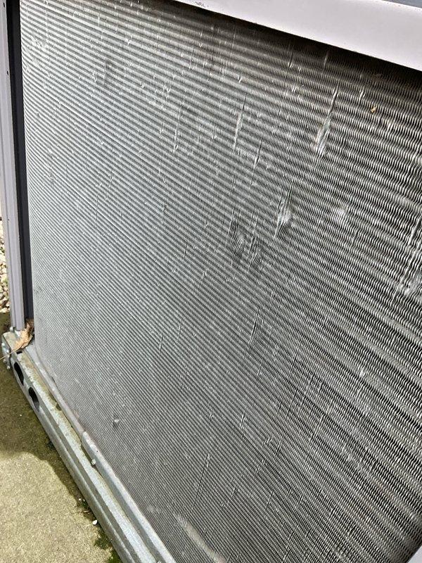 Completed comprehensive BFMA tune-up service on three commercial air conditioning units, all approximately 21 years old. Performed thorough inspection of heat exchanger coils, which showed moderate dust and debris accumulation on the metallic fins. Checked air filter condition in system housing, noting acceptable cleanliness levels with light dust accumulation on fibrous media. Inspected condensate collection pans and verified proper drainage. All units operational within normal parameters upon completion of preventive maintenance procedures.
