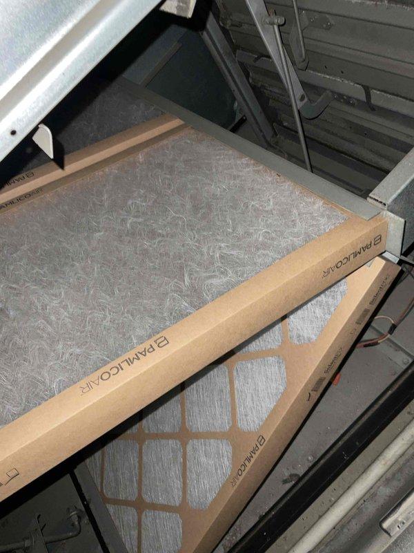 Completed comprehensive BFMA tune-up service on three commercial air conditioning units, all approximately 21 years old. Performed thorough inspection of heat exchanger coils, which showed moderate dust and debris accumulation on the metallic fins. Checked air filter condition in system housing, noting acceptable cleanliness levels with light dust accumulation on fibrous media. Inspected condensate collection pans and verified proper drainage. All units operational within normal parameters upon completion of preventive maintenance procedures.