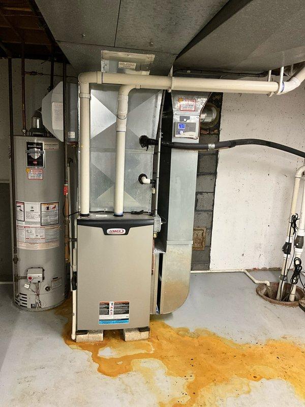 Completed full HVAC system replacement consisting of Lennox EL297UH090XV36CK high-efficiency gas furnace, EL16KC1-036-230 3-ton condenser unit, cased evaporator coil model AA1210, and P200 condensate pump. Installed new 20-amp 2-pole breaker for electrical service, ran white PVC condensate drainage lines, and connected all ductwork to existing distribution system. Coordinated with licensed plumber for domestic water heater and sump pump installation to complete basement mechanical room upgrade.